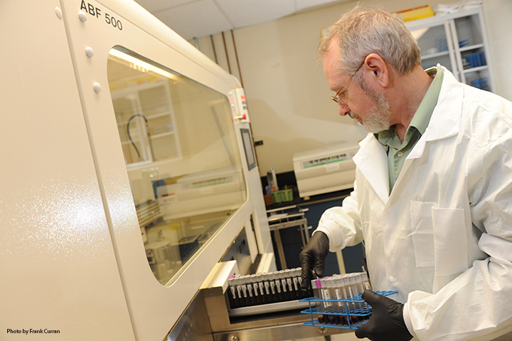 Don Humphries, Scientific Lab Director for the MVP Biorepository, processes new DNA donations from Veterans